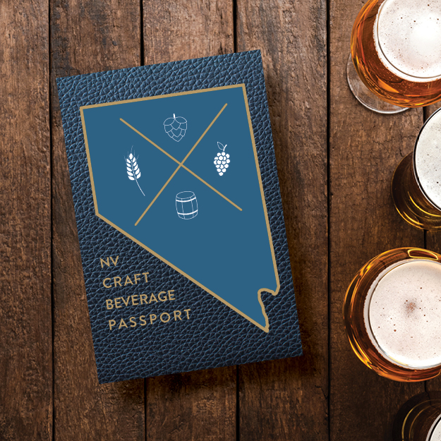 The Nevada Craft Beverage Passport on a wooden table with craft beverages.